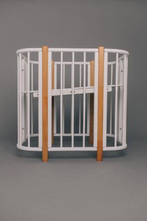 Кроватка КАРАМЕЛЬ с комплектом матрасов и маятником 19