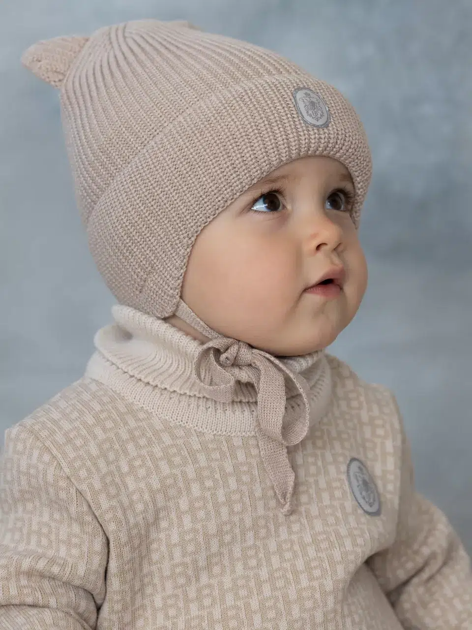 Шапка зимняя Наследник Выжанова бежевый с ушками 4